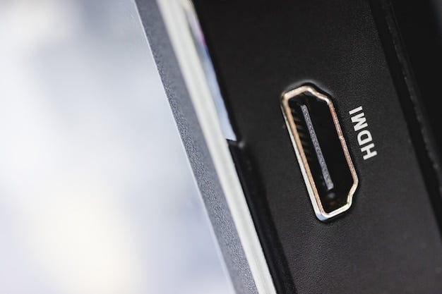 A close-up shot of the latest Apple TV device, highlighting its sleek design and advanced connectivity ports. The background is blurred, focusing attention on the device itself.
