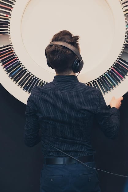 A musician using AI software to compose music, highlighting the blend of human creativity and artificial intelligence in music production.