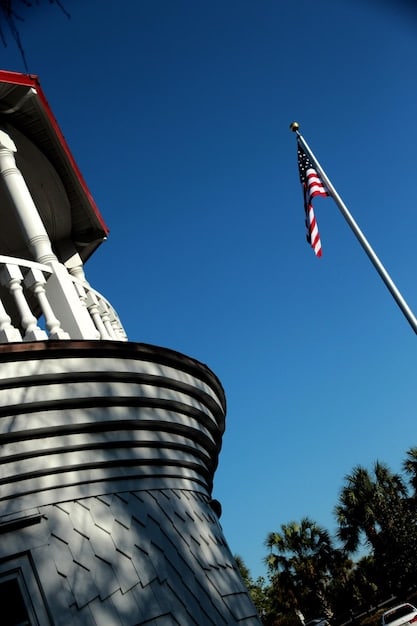 Close-up of a state government building in California, emphasizing the legislative aspect of the film tax credits. A gavel and official documents related to entertainment industry regulations are in the foreground.