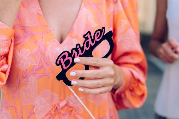 A close-up shot of a celebrity wearing a custom gown with a political message embroidered on it, highlighting the detailing and the impactful statement being made through fashion.
